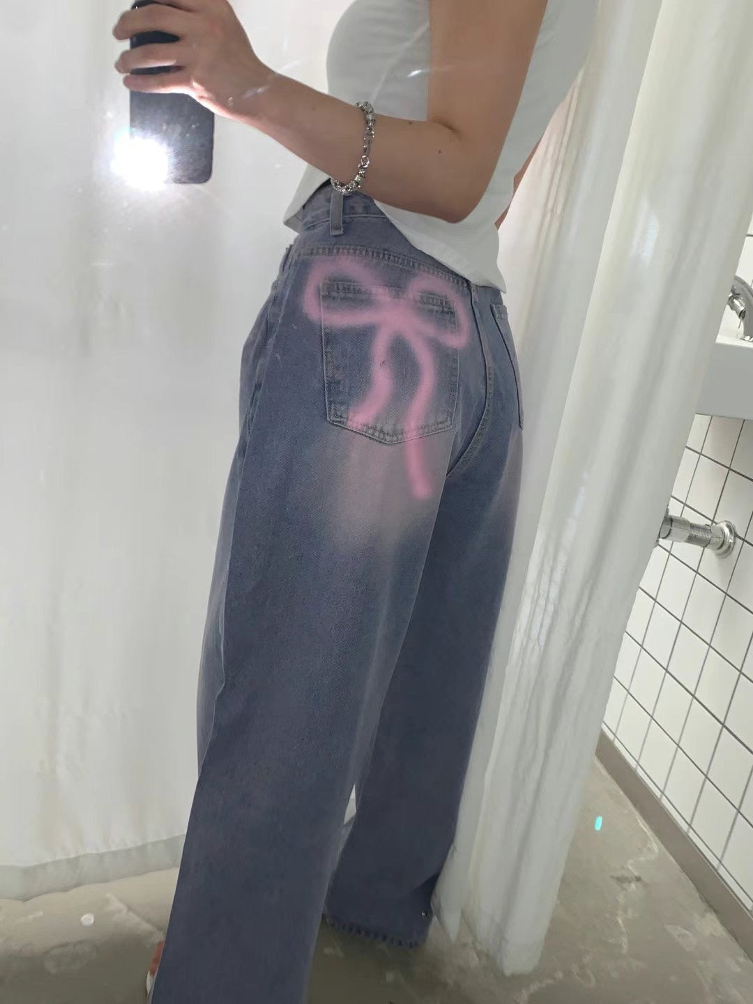 噴漆蝴蝶結牛仔褲