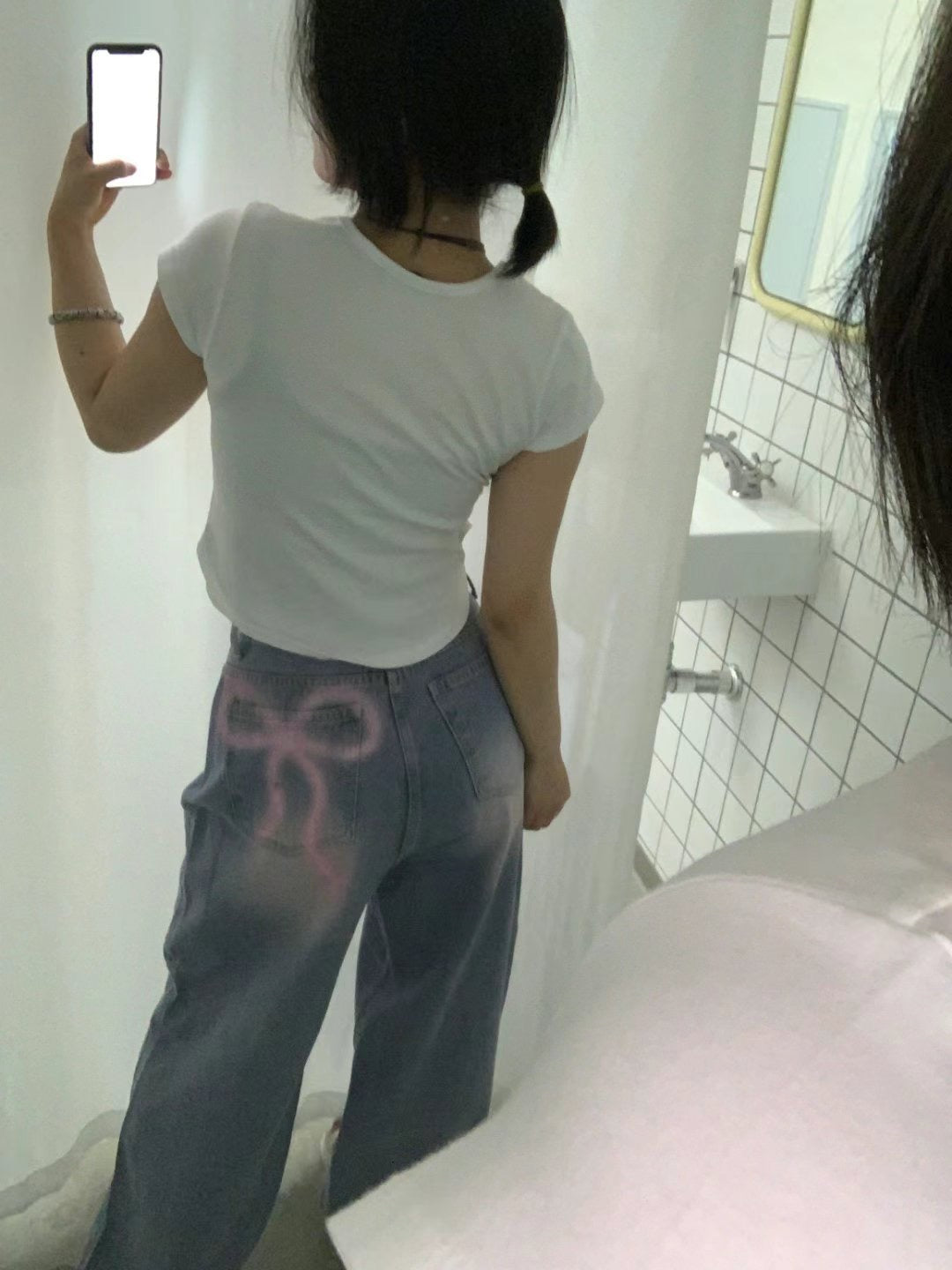 噴漆蝴蝶結牛仔褲